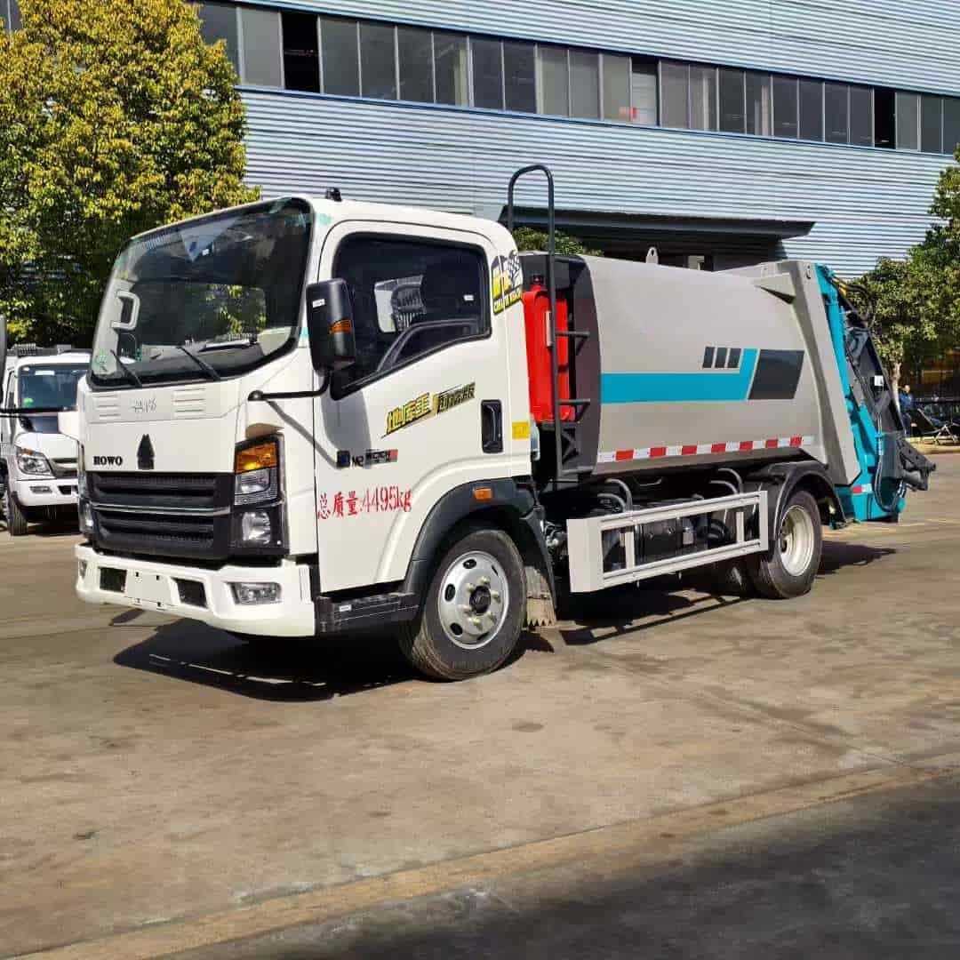 重汽豪沃2100高度地库王蓝牌4.5立方压缩垃圾车